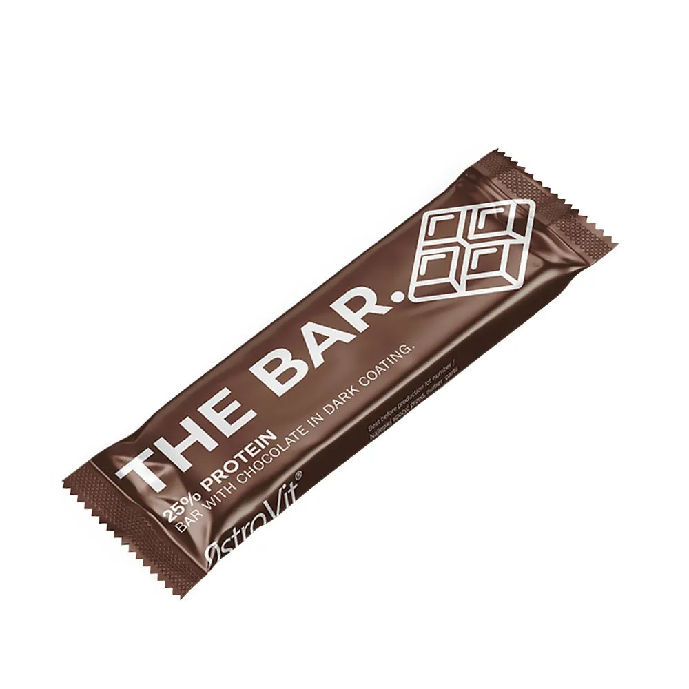 OstroVit THE BAR 60g high-protein snack bar with chocolate flavor, featuring 15g protein per bar, suitable for athletes and active lifestyles. Brown wrapper with white text.